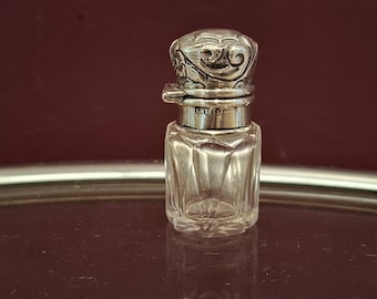A Small EDWARDIAN  Hallmarked Repousse Sterling Silver Capped Cut Glass Perfume Bottle including Internal Stopper, Birmingham Assay c1904