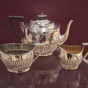 Antique Silver Plated Matched Tea Set of 3 by Walker & Hall Comprising of a Teapot, Sugar Pot/Bowl and Milk/Cream Jug. c1905 - 1910
