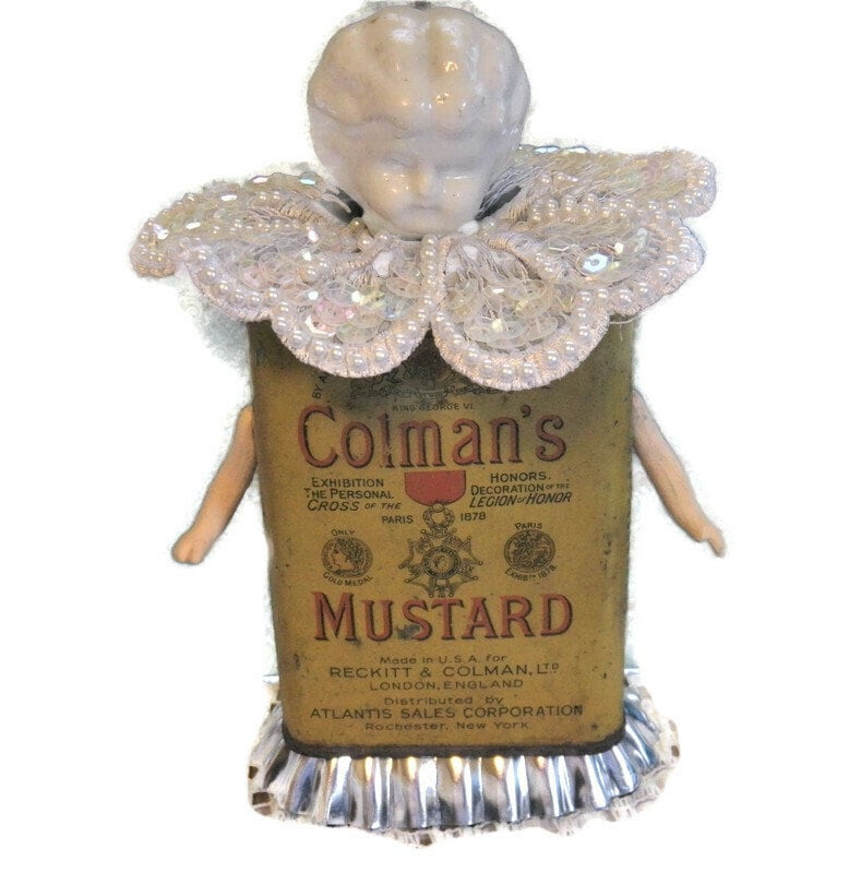 Frozen Charlotte on an Authentic Colman's Mustard Tin