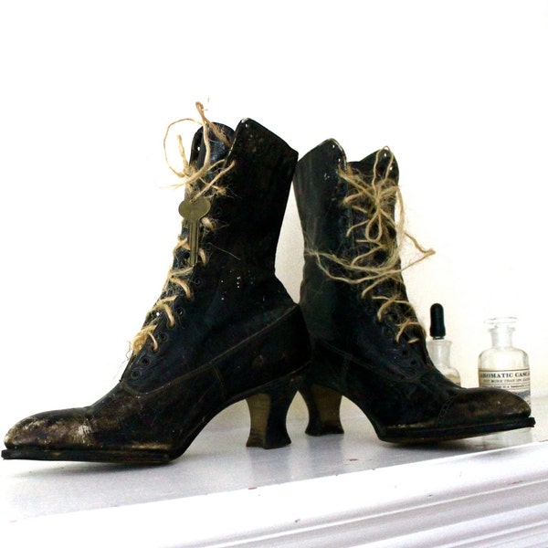 Vintage pair of Witches Boots circa 1910 complete with keys and rope laces