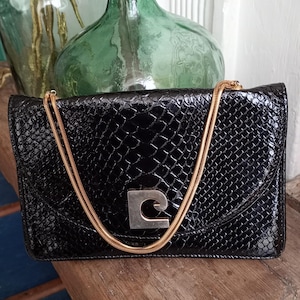 Pierre Cardin clutch bag, black reptile leather style.