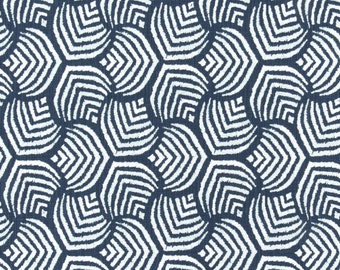 May include: A navy blue and white patterned fabric featuring a repeating geometric design. The pattern consists of white, curved, angular shapes arranged in a honeycomb-like structure. The fabric has a textured appearance.