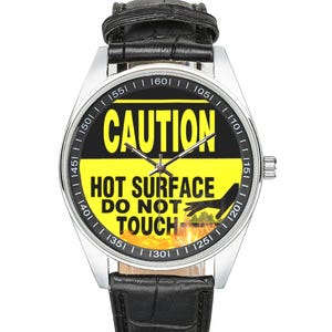 ¡PRECAUCIÓN! SUPERFICIE CALIENTE Humor en la cocina Ver
