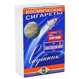 May include: A rectangular cigarette pack with a blue background featuring a graphic of Earth, a space capsule, and the text "КОСМИЧЕСКИЕ СИГАРЕТЫ", "СПУТНИК", "Слава Советской науке!", and "ЯВА". The design includes white light streaks and a red star on the globe.