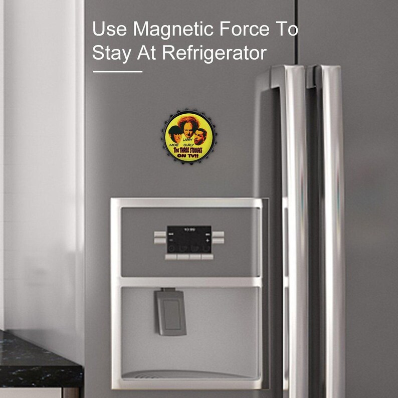 May include: A round bottle cap magnet featuring the Three Stooges. The magnet is attached to a refrigerator. The text on the magnet reads "MOE CURLY The THREE STOOGES ON TV!!" and "Use Magnetic Force To Stay At Refrigerator".