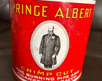 Prince Albert crimp cut tobacco tin can. Process patented July 30, 1907. 5.5”
