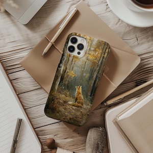 May include: A rectangular smartphone case featuring an oil painting style illustration of a fox sitting in a forest. The scene depicts a fox looking upward amidst tall trees with golden autumn leaves and a dark, earthy forest floor with fallen foliage.