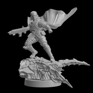 May include: A white painted miniature figurine of a character holding a weapon, standing on a rocky base with a dragon-like design.