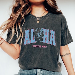 Trendy Aloha T-shirt, Summer Comfort Shirts, State Of Mind Varsity Hawaii Shirt, Hibiscus Flower Tee, Aloha Vacation Apparel, Summer Gift