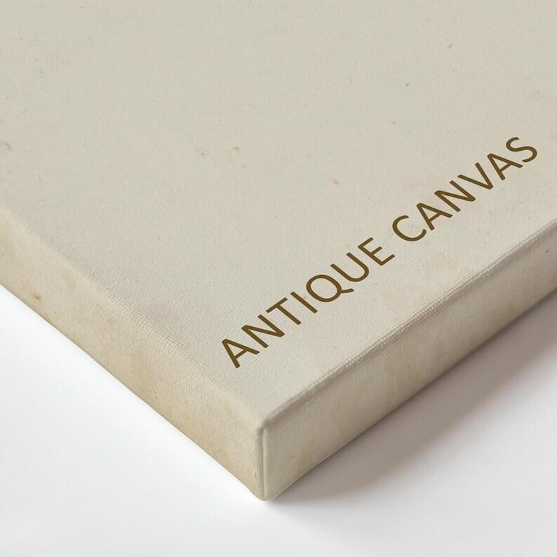 a close-up view of a beige canvas with the text "ANTIQUE CANVAS" printed on it.