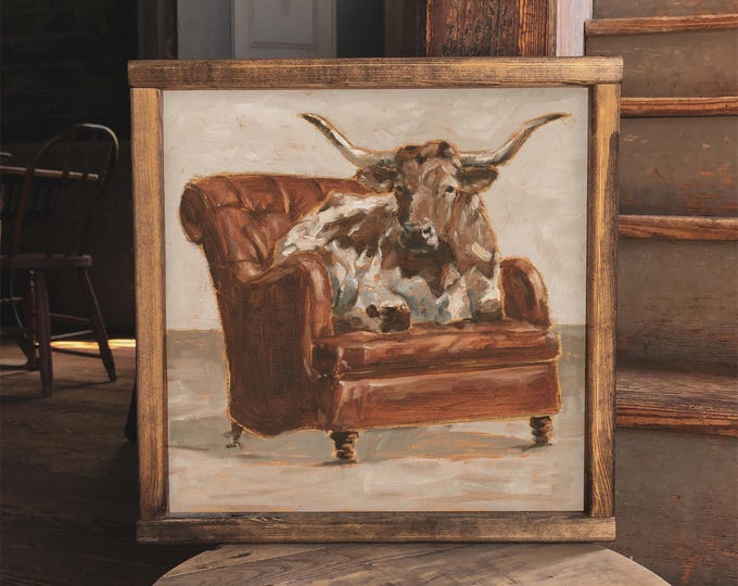 Longhorn Steer Sitting in a Leather Chair. Fine Art Print by Ethan Harper. Cow Art and Home Decor