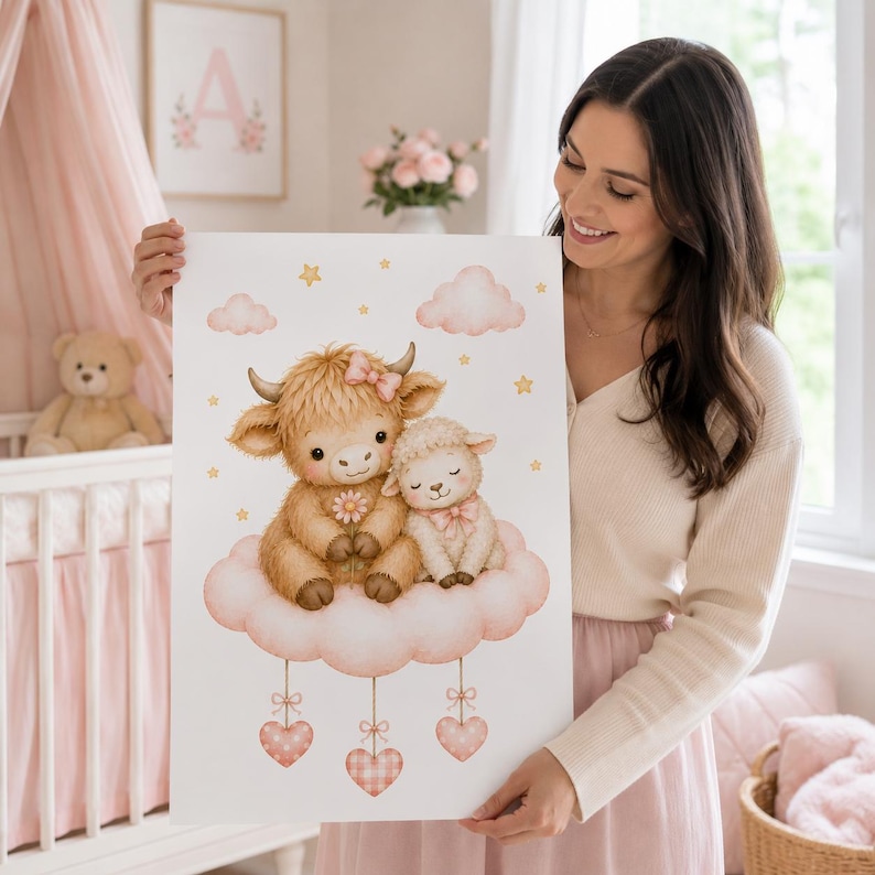May include: A rectangular wall art print featuring a fluffy brown highland cow and a white lamb sitting together on a large pink cloud. The illustration includes small yellow stars, pink clouds, and three hanging pink heart ornaments with bows.