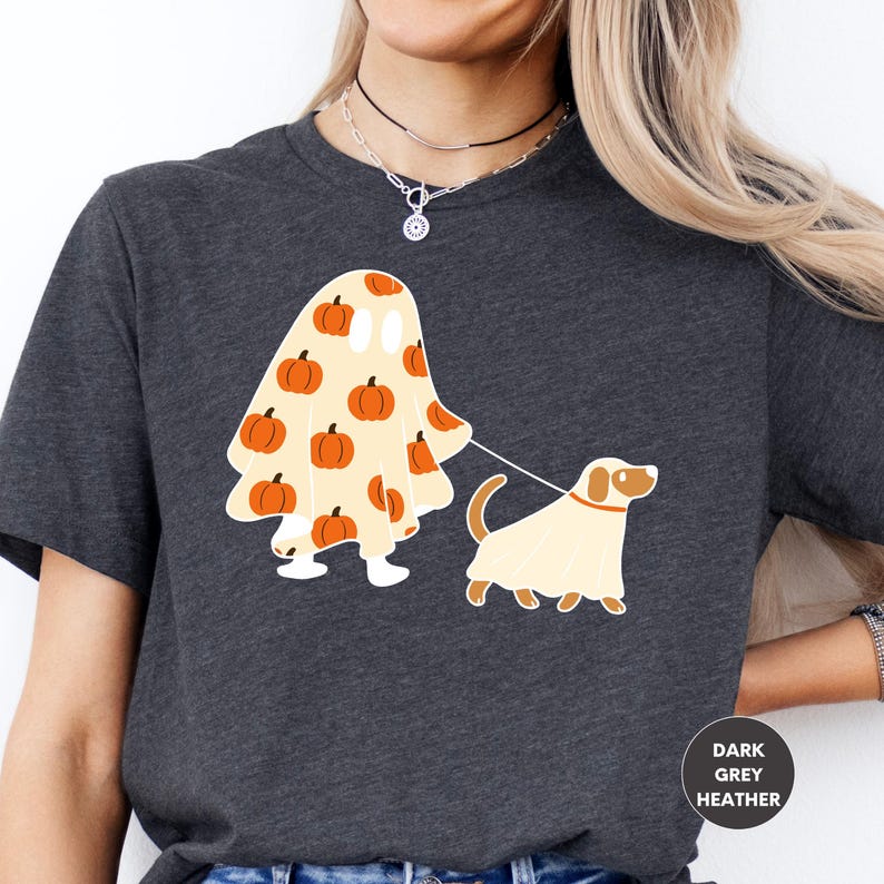 a woman wearing a t - shirt with a dog on it
