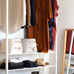 Large felt containers from Skandinavious By Louise Vilmar used in wardrobe