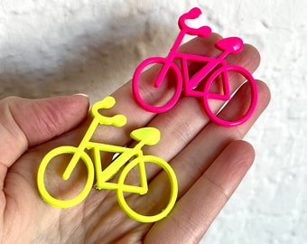 80s Neon Pink and Yellow Retro Bicycles Plastic Brooches