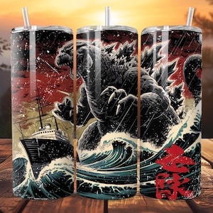 May include: Three stainless steel tumblers with a Godzilla-themed design. The artwork depicts Godzilla emerging from ocean waves, attacking a ship, with Japanese text. The background features a sunset and a stormy sky.