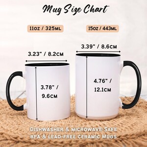May include: Mug size chart showing two white ceramic mugs with black handles and black rims. The mugs are 11oz/325ml and 15oz/443ml. The chart includes measurements in inches and centimeters.