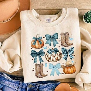 Pumpkin Coquette Bow Sweatshirt, Halloween Bow Sweater, Pumpkin Halloween Shirt, Spooky Season Tee, Pumpkin Halloween Crewneck, Spooky shirt