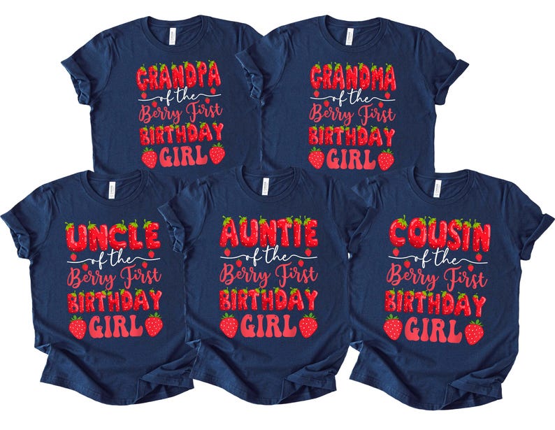 May include: Navy blue t-shirts with red text and strawberry graphics. The shirts read "Grandpa," "Grandma," "Uncle," "Auntie," and "Cousin" above "of the Berry First Birthday Girl."