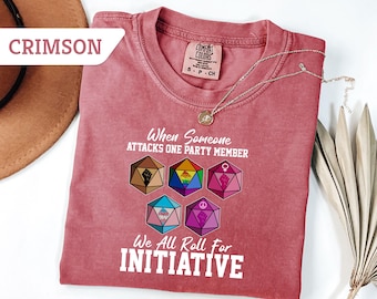 Camiseta "Cuando alguien ataca a un miembro del grupo", "Todos tiramos por la iniciativa", "Dados de rol", "Igualdad de derechos"