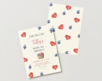 May include: A white invitation card with a red and blue berry pattern. The text on the card reads "Join us for Tilly's Berry 1st Birthday, Saturday May 12, 2023, 2pm at Tilly's Garden, 1234 Main St, Anytown, TN".