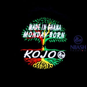 May include: Black graphic with the text "MADE IN GHANA MONDAY BORN KOJO" in white, green, red, and yellow. The design features a tree with roots and leaves, and the brand name "NIIASH FASHION".