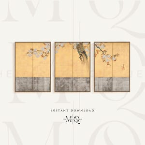 May include: A set of three framed prints featuring a traditional Japanese painting of a tree branch with delicate white blossoms against a gold background. The prints are framed in a simple, modern style.