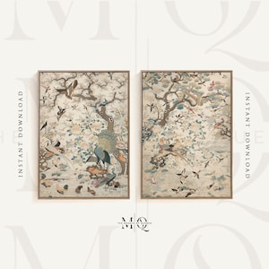 May include: Two framed prints of vintage Japanese artwork depicting a forest scene with birds and peacocks. The prints are in a light beige colour scheme with brown frames.