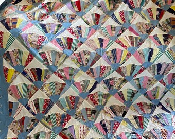 Vintage hand pieced hand tied fan quilt