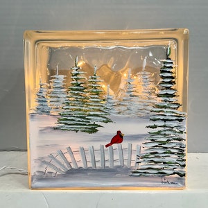 Glass block night light winter trees with cardinal on fence