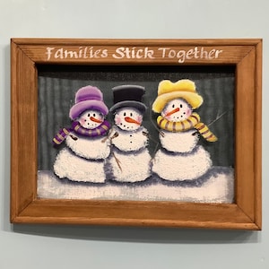 Snowman family of 3 Painted window screen framed wall hanging