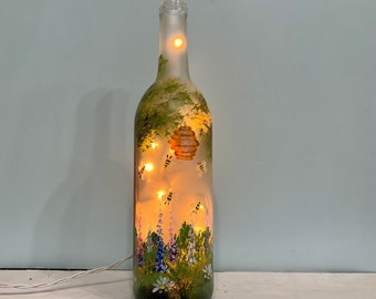 Garden with bees wine bottle light