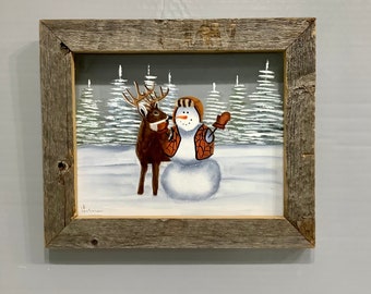 Framed glass painting snowman hunter with deer