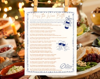 May include: A white card with a blue border and the text "Pass the Wine Bottle" is held by wooden clips. The card has a poem with illustrations of a wine bottle, wine glasses, a football, and a pie.