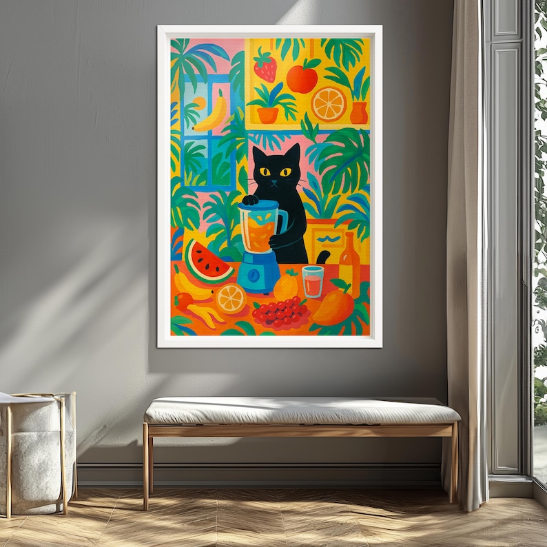 May include: A framed wall art print featuring a black cat standing at a table, blending fruit in a blue blender. The vibrant illustration includes a watermelon slice, bananas, oranges, grapes, and a mango, set against a backdrop of green tropical plants.