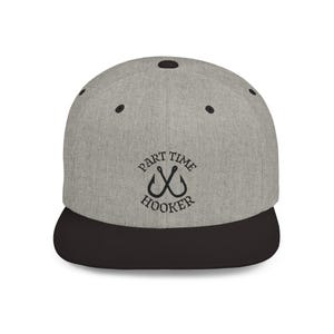May include: A gray and black baseball cap with the text "Part Time Hooker" and two crossed fishing hooks in a circle.