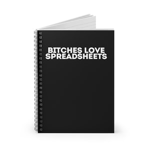 May include: A black spiral notebook with the text "BITCHES LOVE SPREADSHEETS" in white letters.