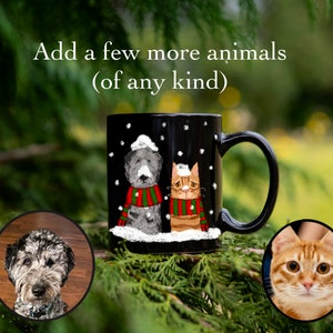 May include: Black coffee mug with a winter scene featuring a dog and cat wearing scarves. The mug has a white handle and is decorated with snowflakes. The text "Add a few more animals (of any kind)" is written above the mug.