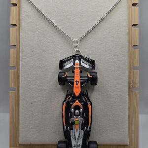 L. Norris #4 2023 Mcl 1/43 Diecast Necklace