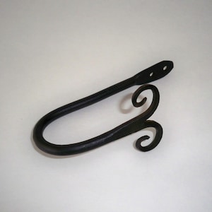 Curtain tie backs in wrought iron sold in pair RAM dble scroll  different sizes
