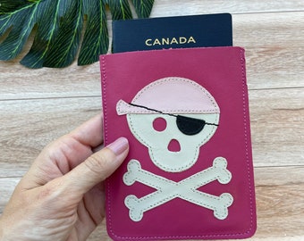 Leather Passport Case, Sleeve Style, Fits USA or Canada Passports, fuchsia with pirate skull and crossbones design