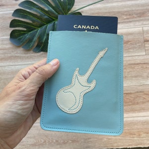 Leather Passport Case, Sleeve Style, Fits USA or Canada Passports, light blue with guitar design