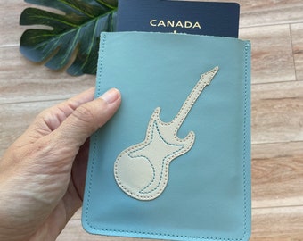 Leather Passport Case, Sleeve Style, Fits USA or Canada Passports, light blue with guitar design