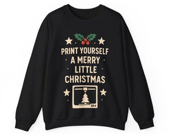 May include: Black crew neck sweatshirt with the text "PRINT YOURSELF A MERRY LITTLE CHRISTMAS" in white. The design includes stars, holly, and a 3D printer with a Christmas tree. A festive holiday-themed garment.