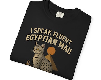 May include: Black t-shirt with the text "I Speak Fluent Egyptian Mau" in beige. The graphic includes an Egyptian Mau cat, a pyramid, and a sun. The shirt has a classic crew neck.