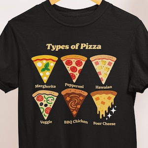 May include: Black t-shirt featuring a graphic of six pizza slices, each representing a different type: Margherita, Pepperoni, Hawaiian, Veggie, BBQ Chicken, and Four Cheese. The text "Types of Pizza" is above the slices.