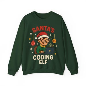May include: A dark green sweatshirt with a graphic of an elf wearing glasses and a Santa hat, coding on a laptop. The text reads "SANTA'S CODING ELF" in red and white, with festive ornaments.