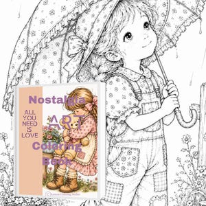 May include: A coloring book titled Nostalgia Art Coloring Book featuring a cover illustration of a child holding a teddy bear. The text on the cover reads Nostalgia Art Coloring Book and All You Need Is Love. The background shows a black and white line drawing of a child holding an umbrella.
