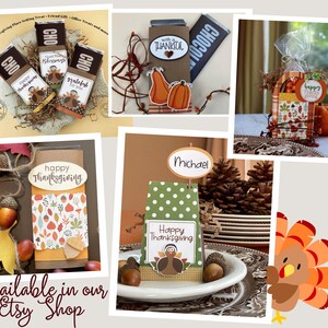 May include: A collection of Thanksgiving-themed gift boxes and favor bags. The boxes are decorated with fall colors, leaves, and turkeys. The bags are decorated with a plaid pattern and a turkey design. The text "Happy Thanksgiving" is featured on several of the boxes and bags.