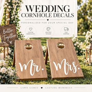 May include: Two wooden cornhole boards featuring white vinyl decals with the text Mr. and Mrs. in a cursive script. The boards have a natural wood grain finish and a circular hole at the top. The image includes text reading Wedding Cornhole Decals.